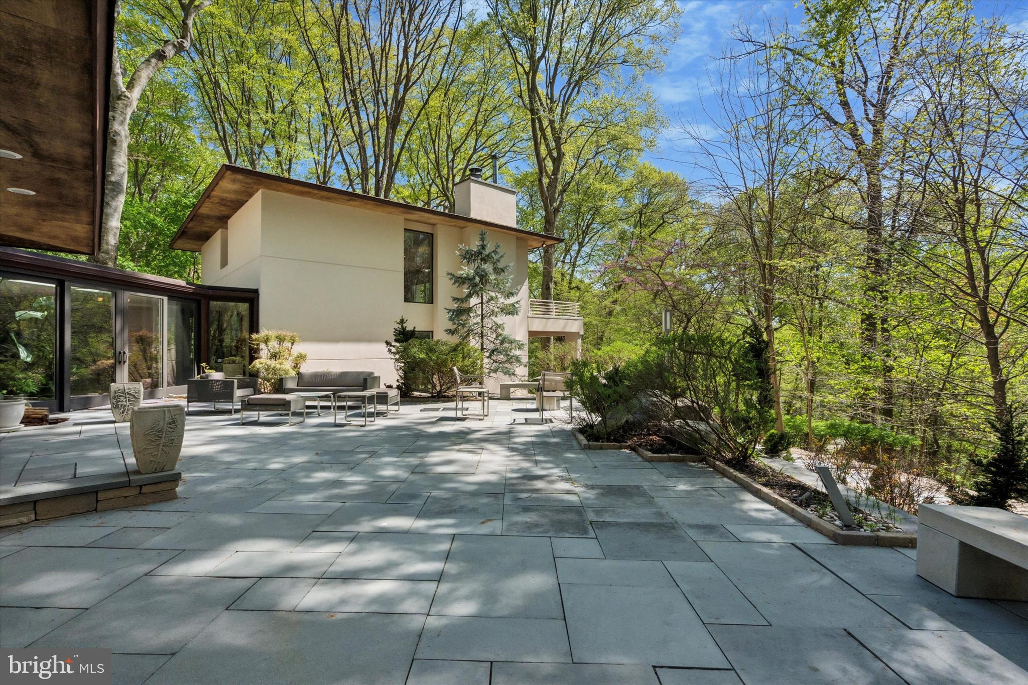 4126 Apalogen Road Philadelphia, PA 19129 - Photo 21 of 75 a view of a house with backyard and sitting area