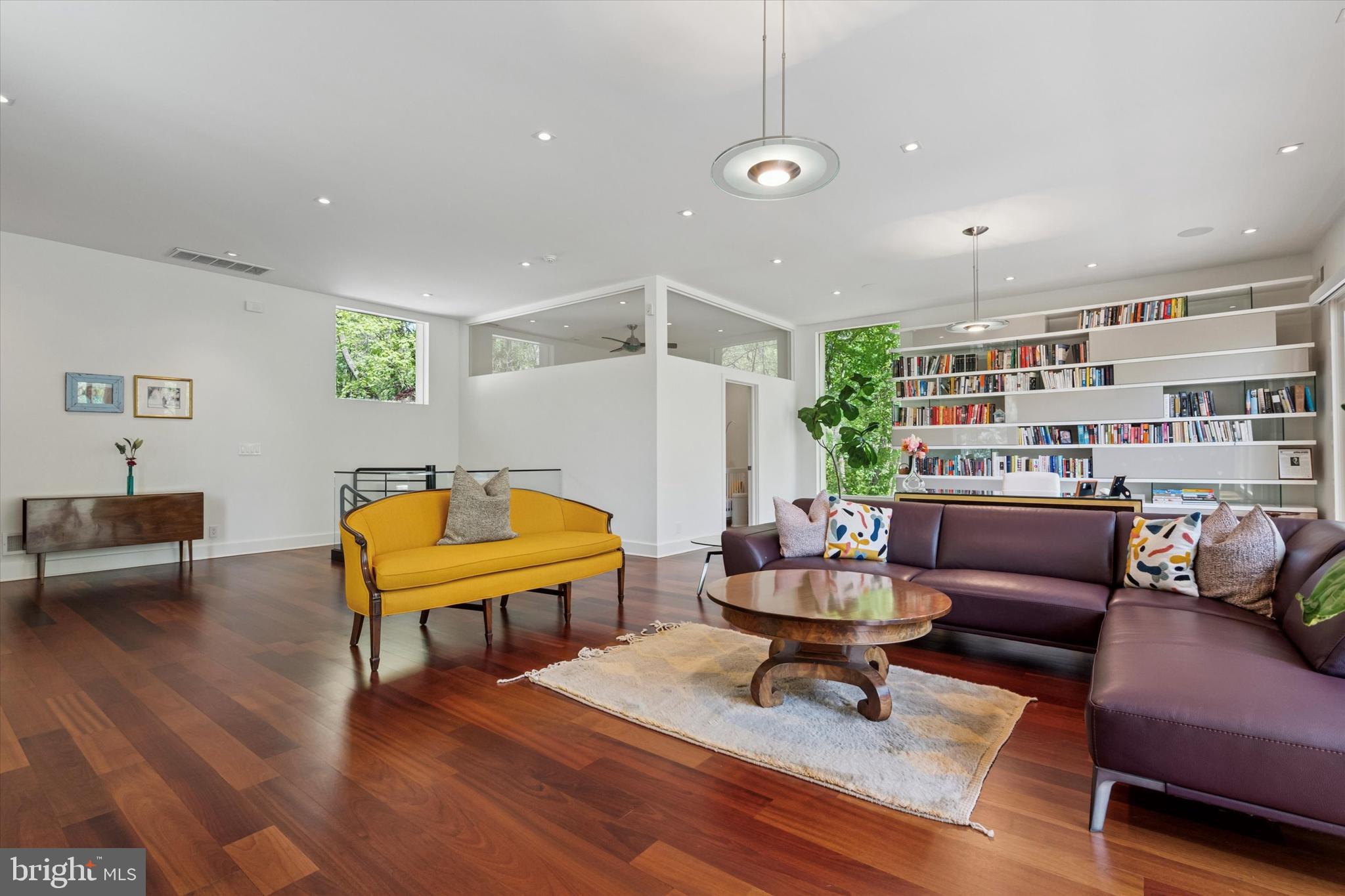 4126 Apalogen Road Philadelphia, PA 19129 - Photo 25 of 75 a living room with furniture a pool table and a potted plant