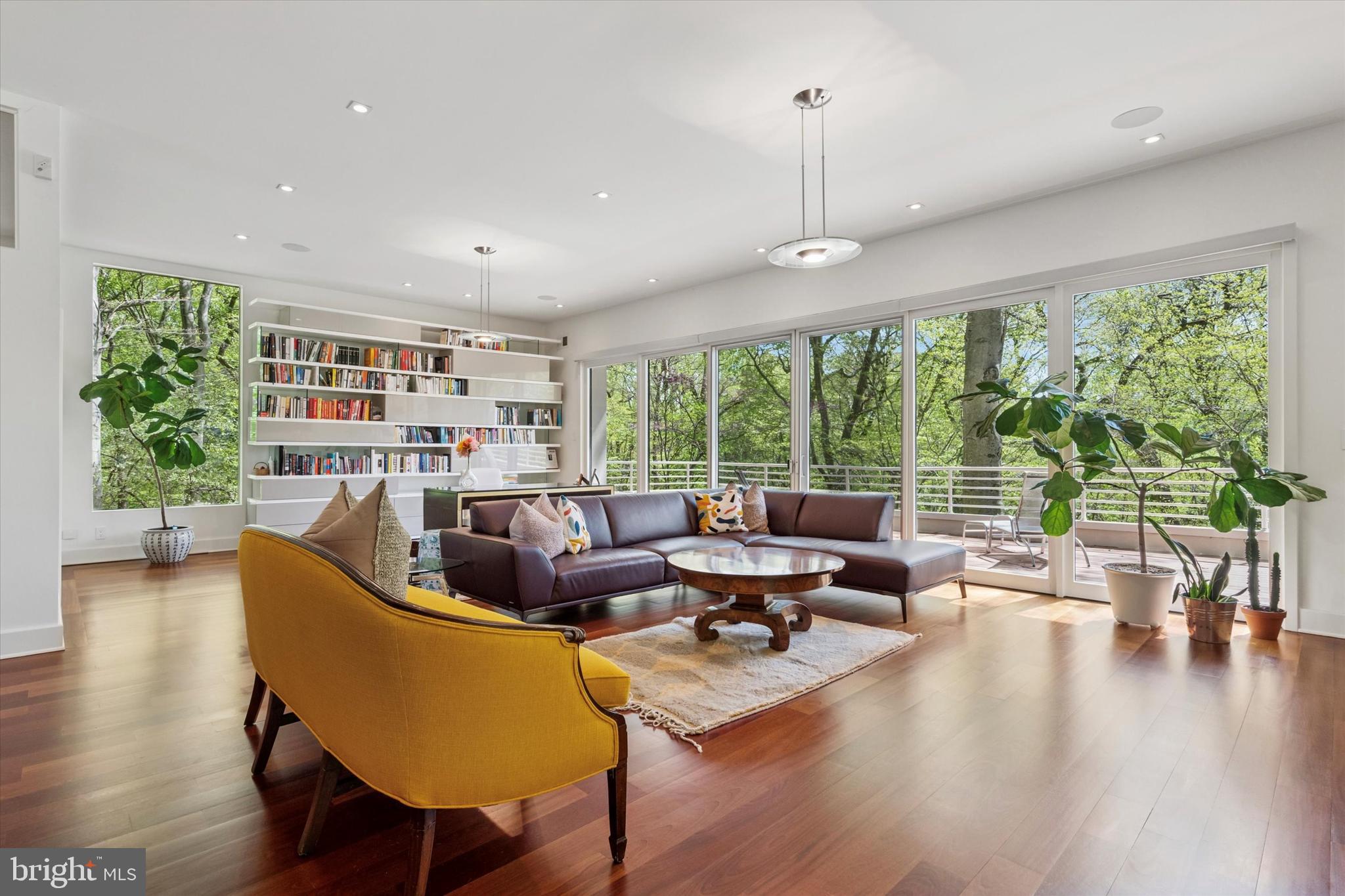 4126 Apalogen Road Philadelphia, PA 19129 - Photo 26 of 75 a living room with furniture and a large window