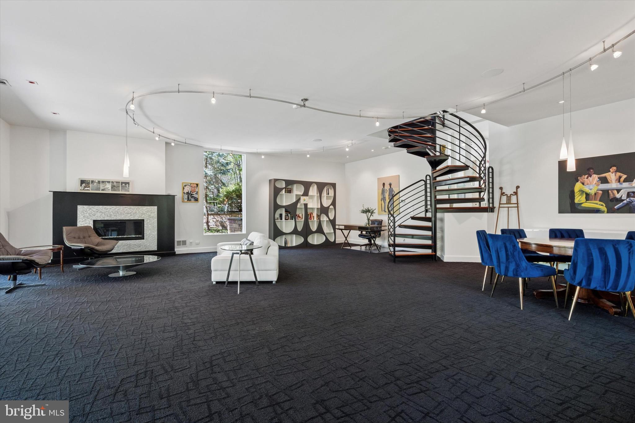 4126 Apalogen Road Philadelphia, PA 19129 - Photo 37 of 75 a living room with furniture and a fireplace