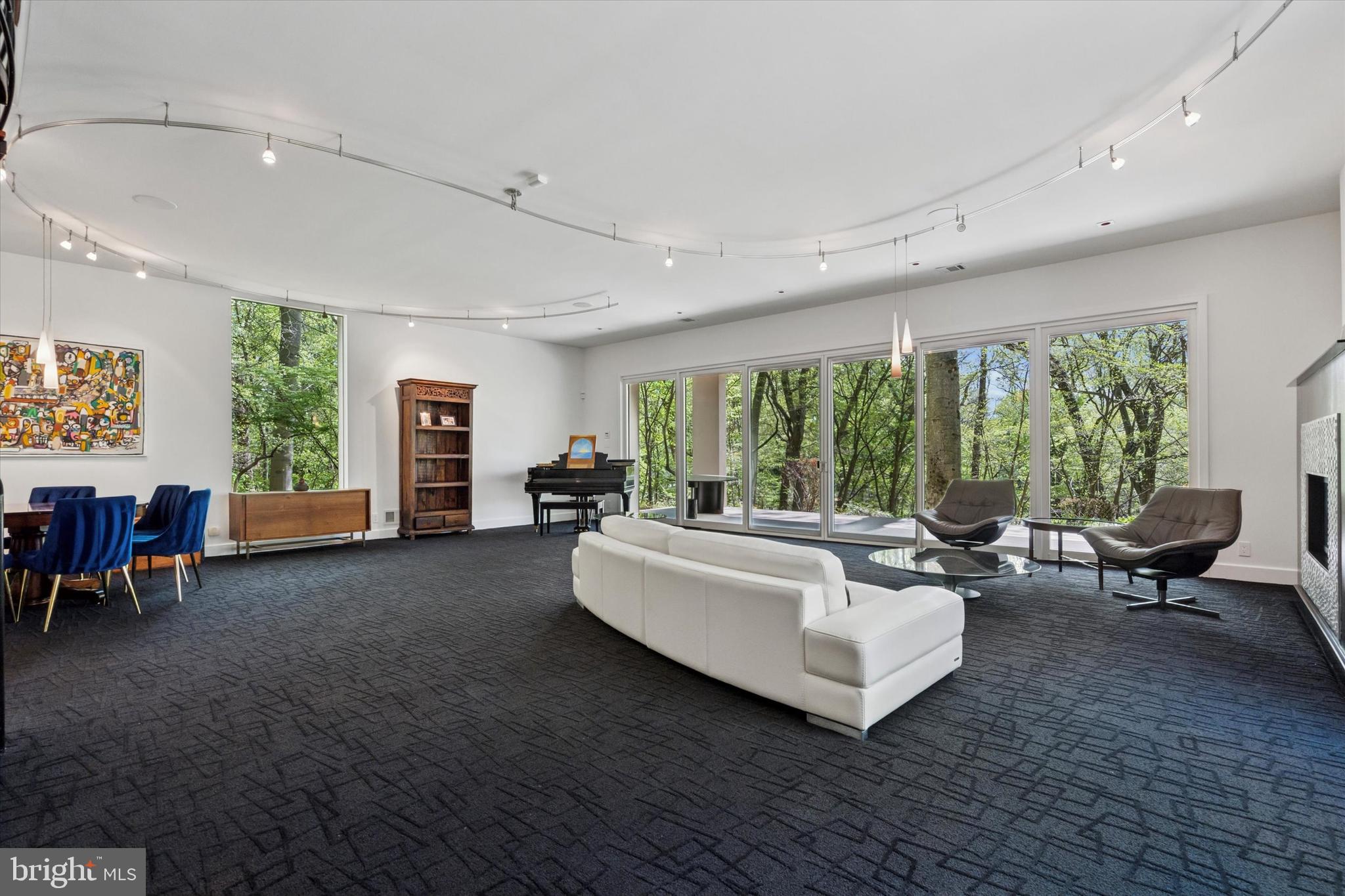 4126 Apalogen Road Philadelphia, PA 19129 - Photo 38 of 75 a living room with furniture and a large window