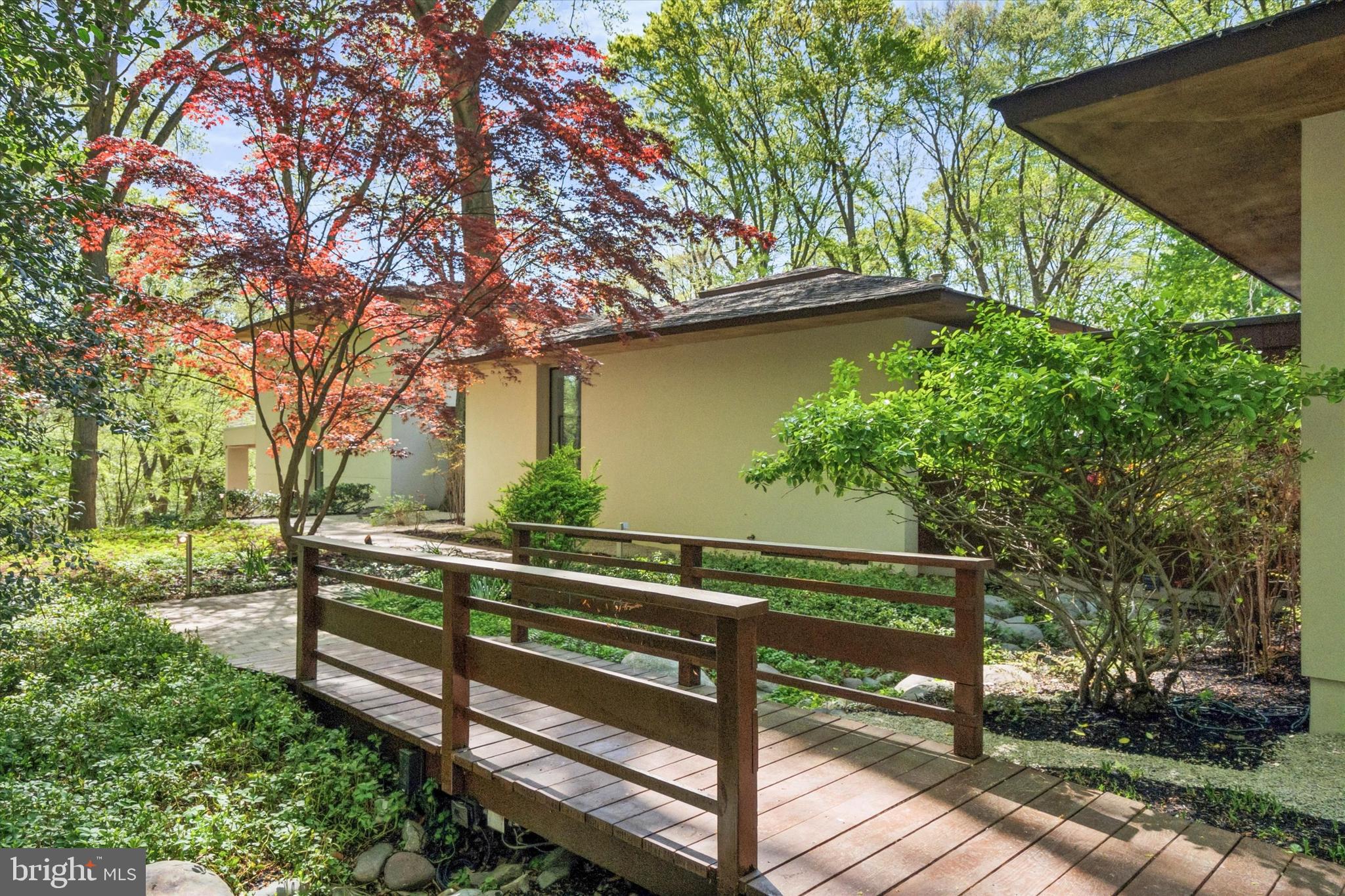 4126 Apalogen Road Philadelphia, PA 19129 - Photo 4 of 75 a view of a bench in a garden