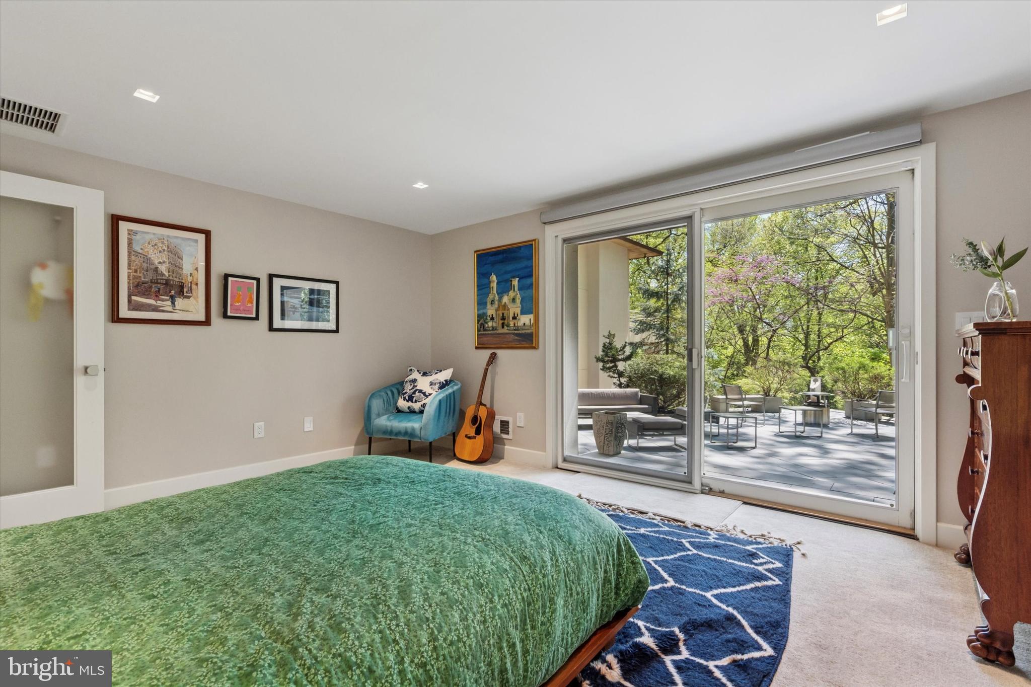 4126 Apalogen Road Philadelphia, PA 19129 - Photo 55 of 75 a bedroom with furniture and a large window