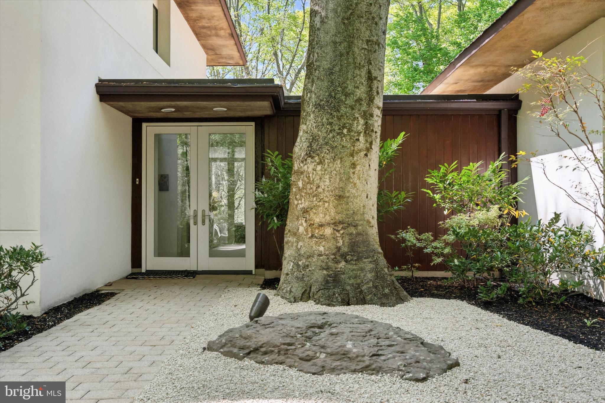 4126 Apalogen Road Philadelphia, PA 19129 - Photo 6 of 75 a view of a front door and a wooden door