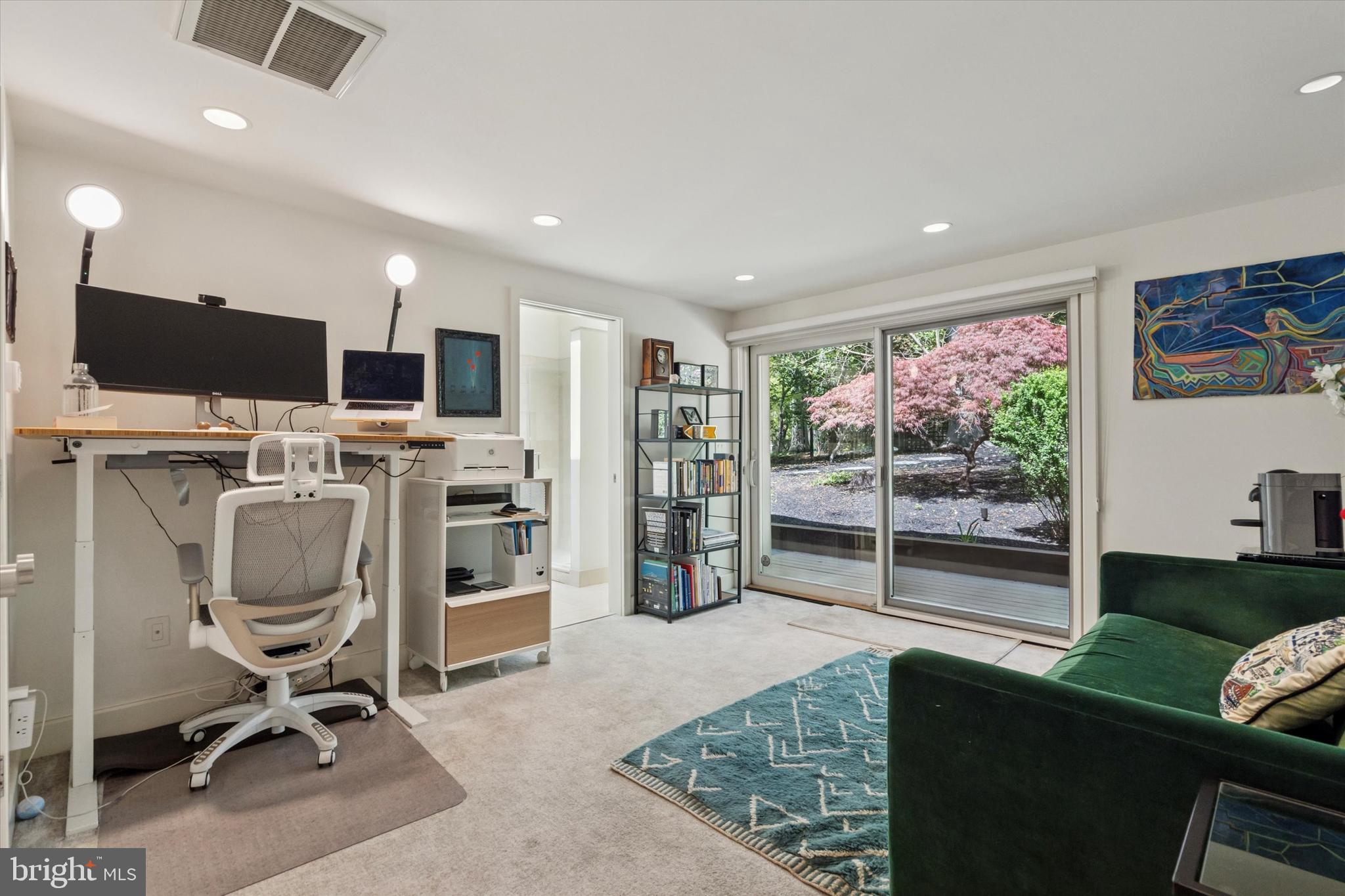 4126 Apalogen Road Philadelphia, PA 19129 - Photo 63 of 75 a view of a livingroom with workspace and a window