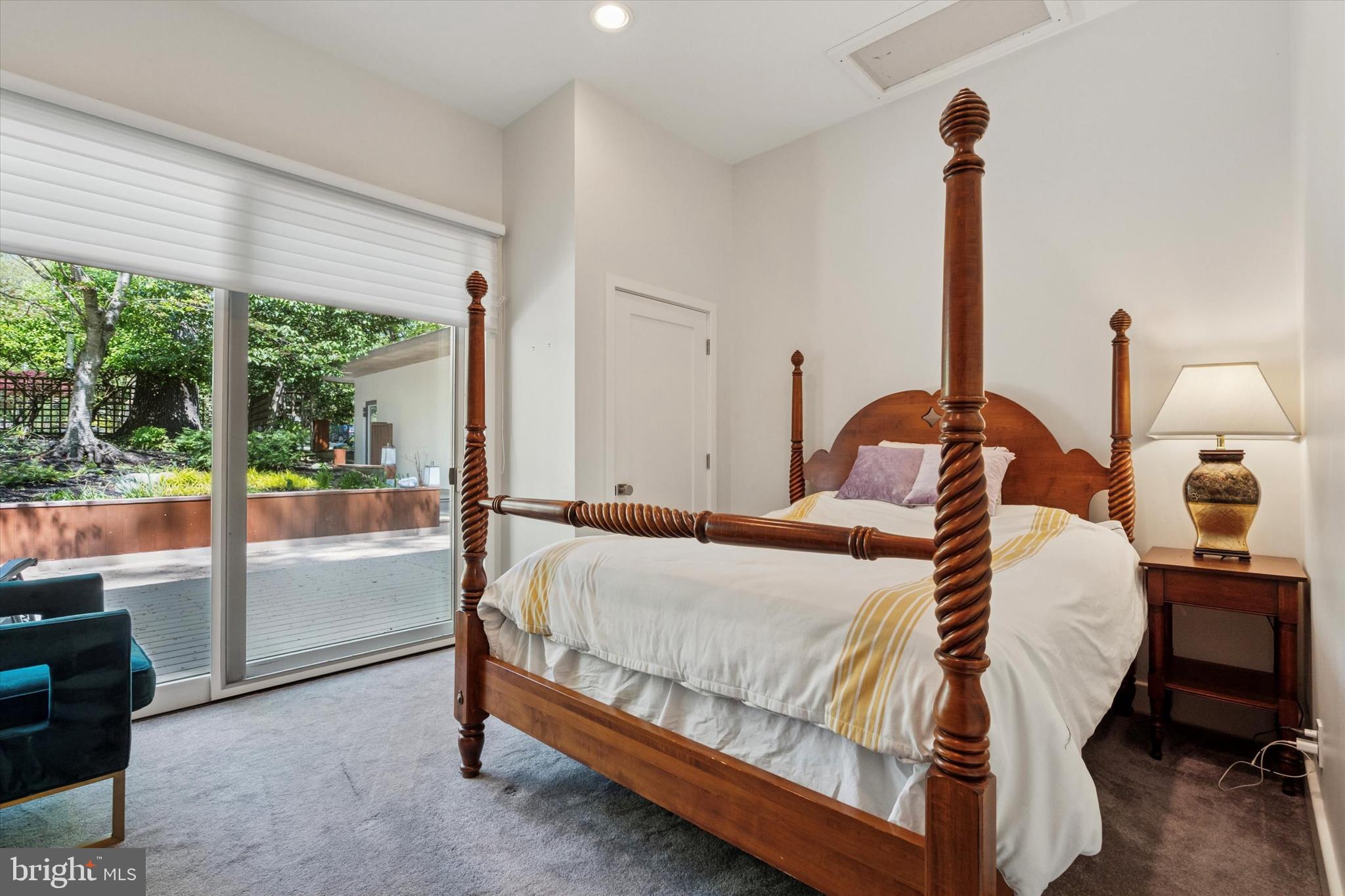 4126 Apalogen Road Philadelphia, PA 19129 - Photo 68 of 75 a bedroom with a bed and large window