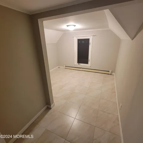 a bathroom with a sink a mirror and a toilet