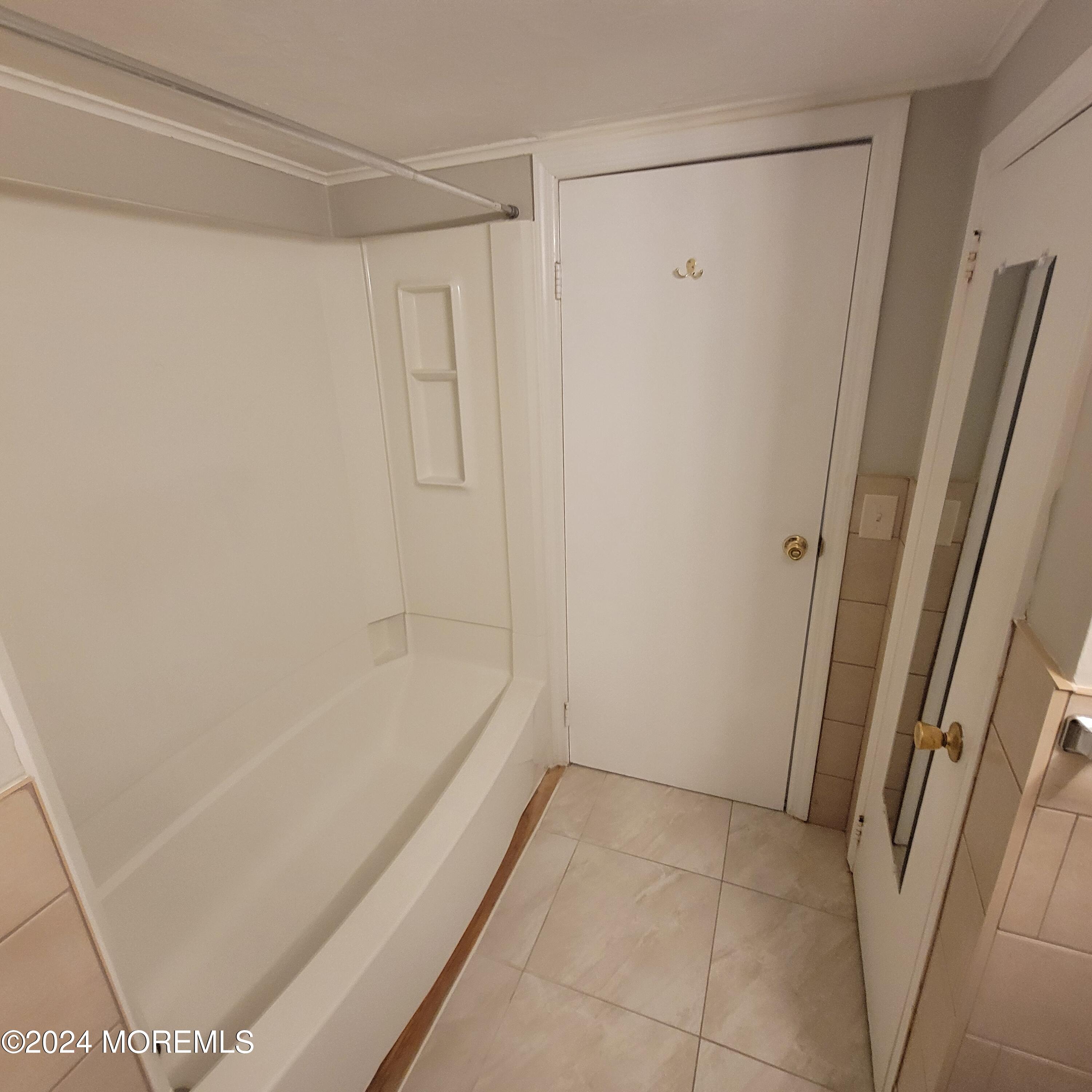 38 Main Street, Unit #5 Keyport, NJ 07735 - Photo 15 of 15 a bathroom with a bathtub and a shower