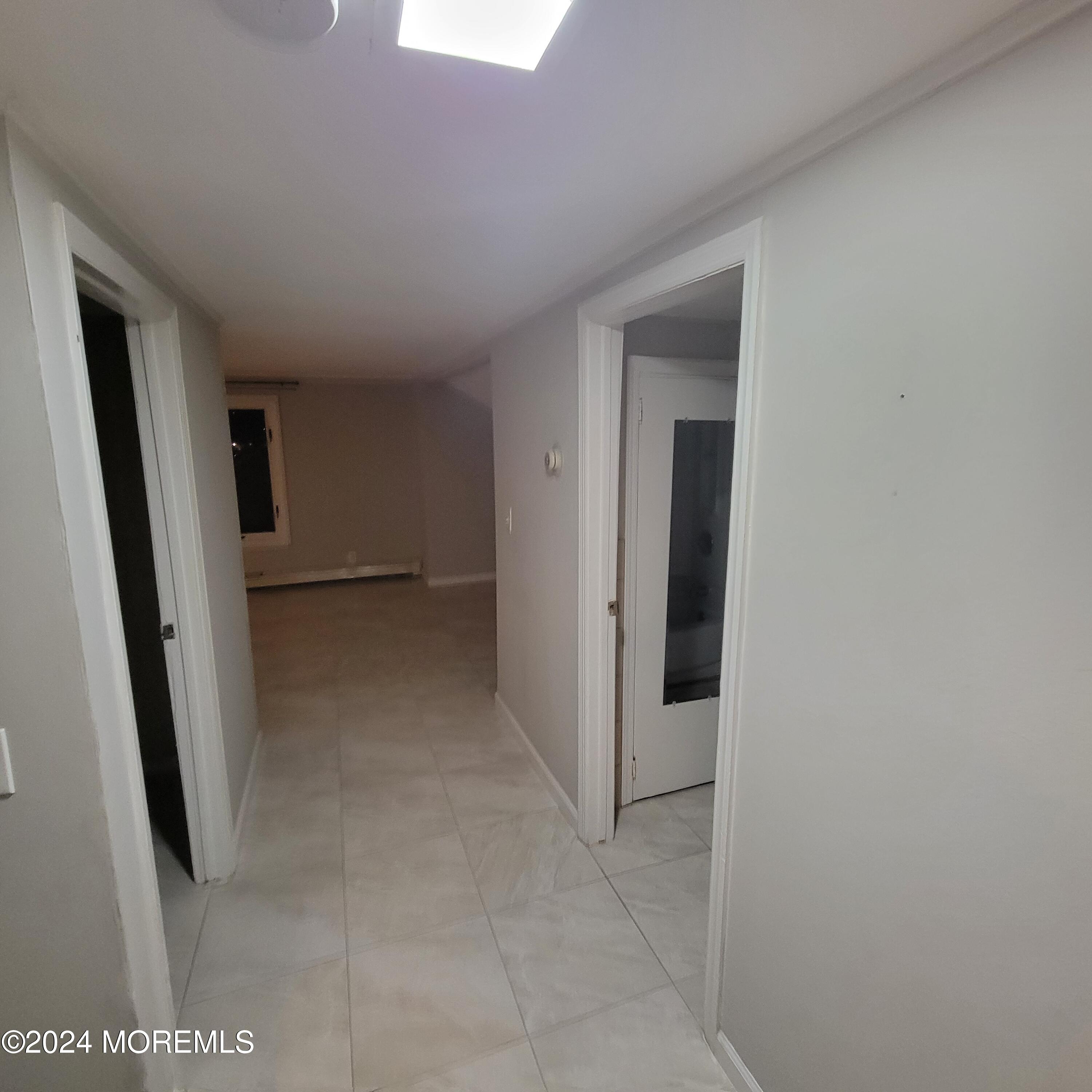 38 Main Street, Unit #5 Keyport, NJ 07735 - Photo 6 of 15 a view of hallway with stairs
