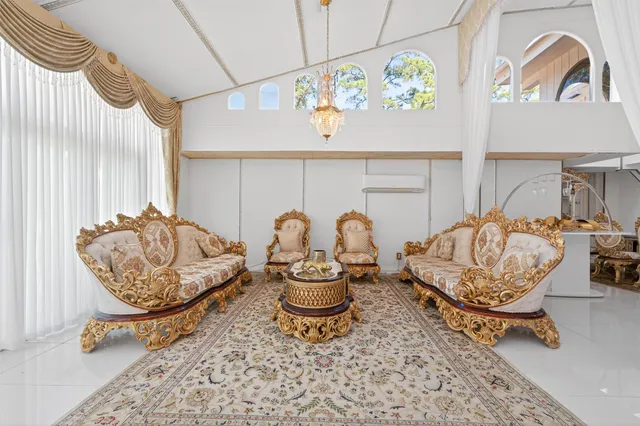 a living room with furniture and a table