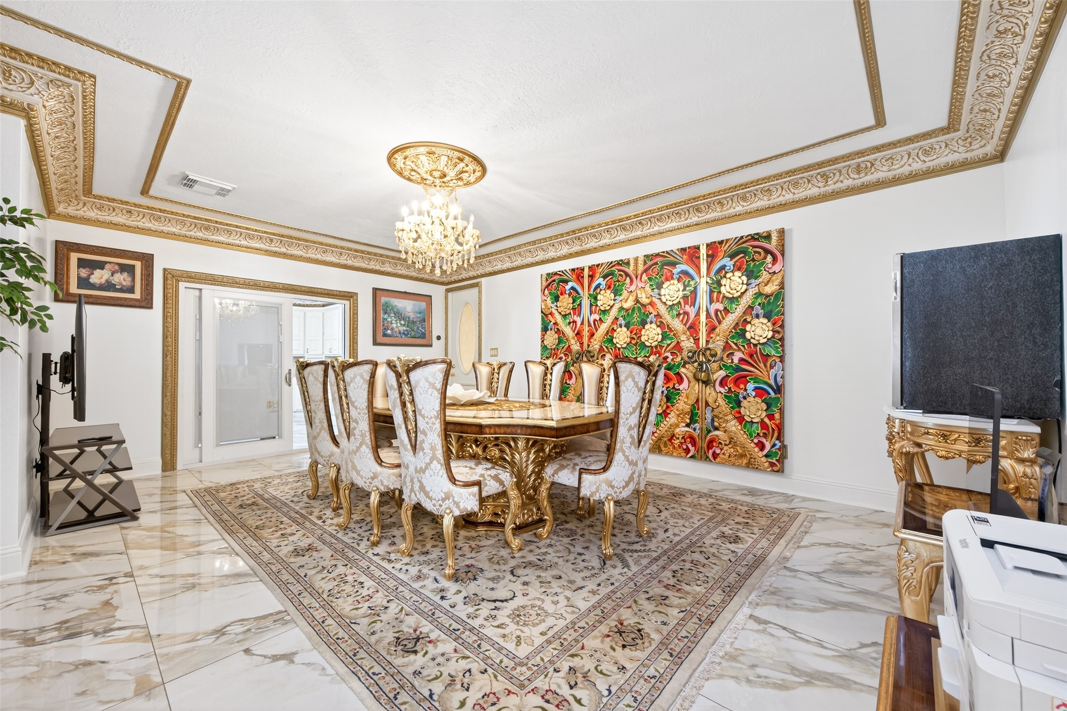 24 Windermere Lane Houston, TX 77063 - Photo 31 of 49 a view of a dining room with furniture a chandelier and wooden floor