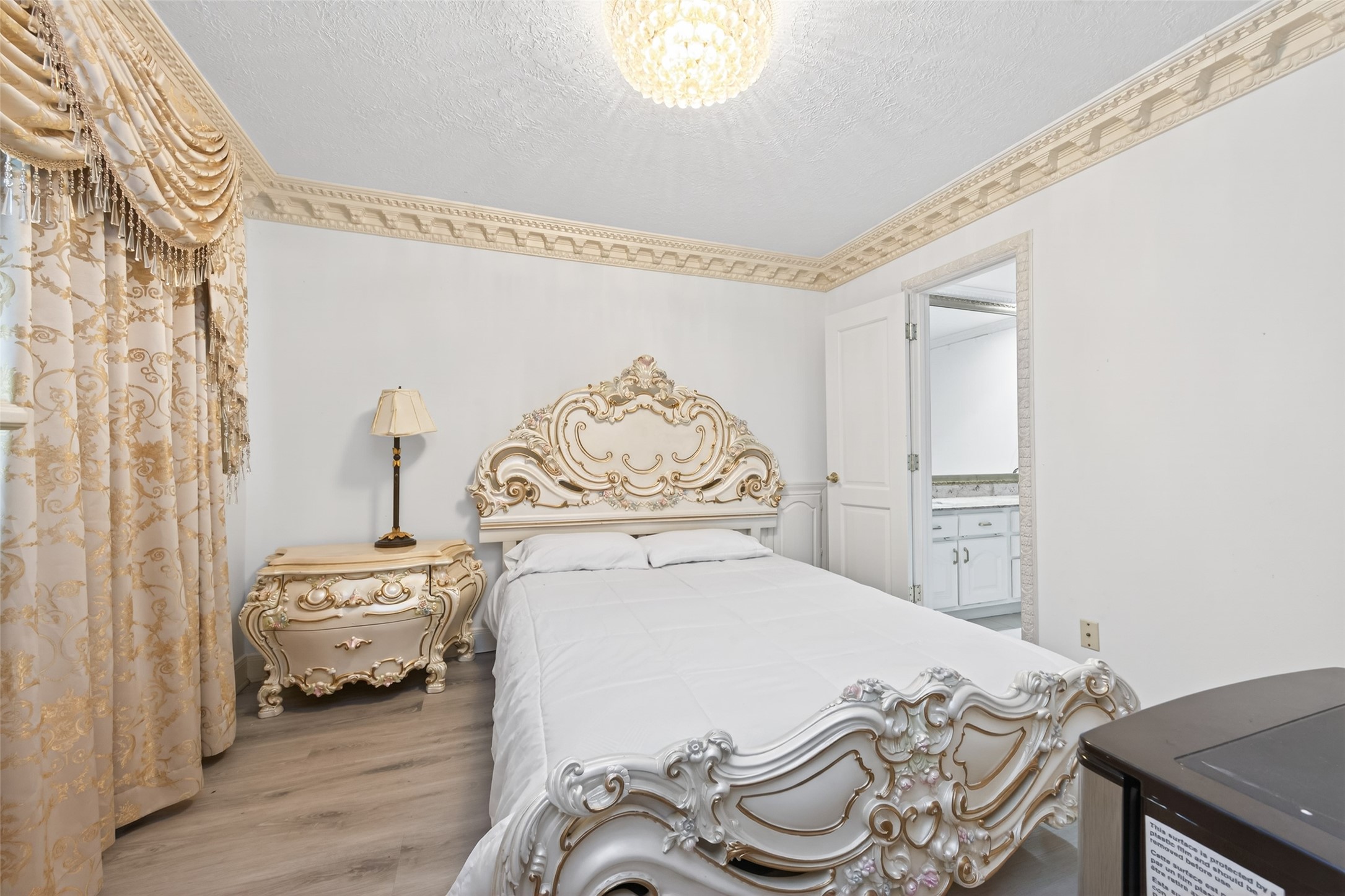 24 Windermere Lane Houston, TX 77063 - Photo 36 of 49 a bedroom with a bed and a window