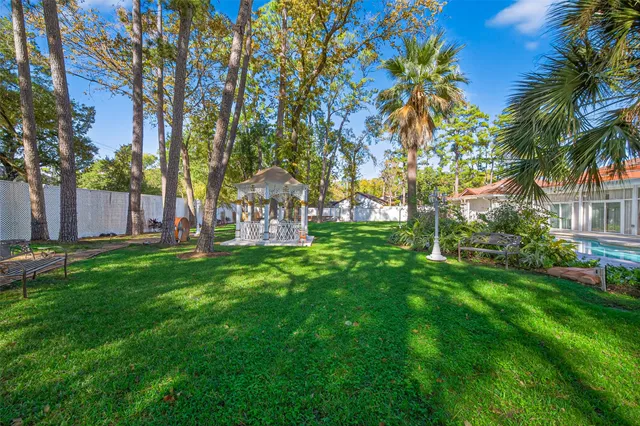 a view of a garden with a patio