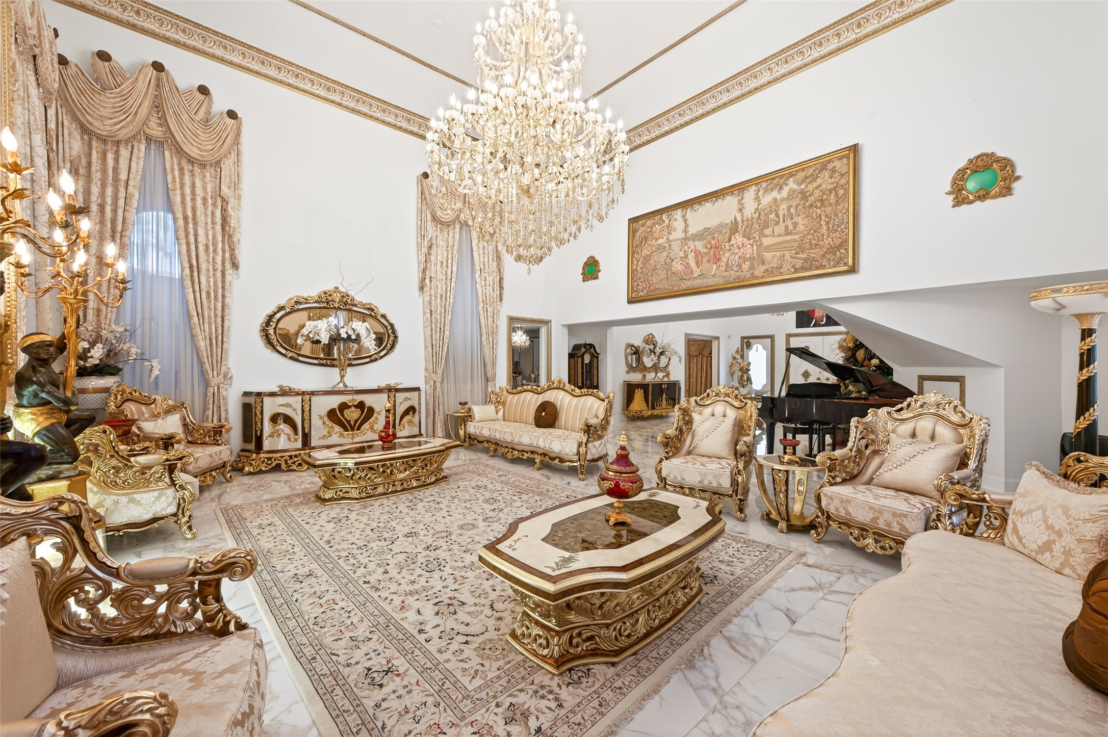 24 Windermere Lane Houston, TX 77063 - Photo 5 of 49 a living room with furniture and a chandelier