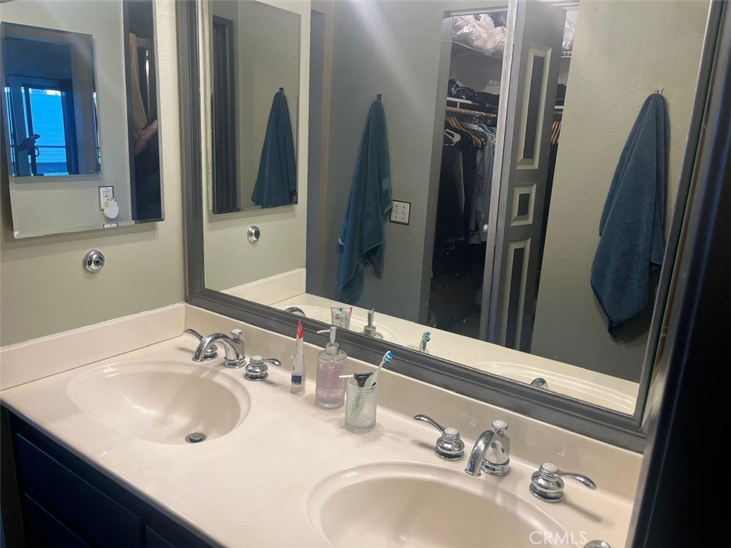 191 C. Mayor Redondo Beach, CA 90277 - Photo 12 of 20 a bathroom with a sink and a mirror