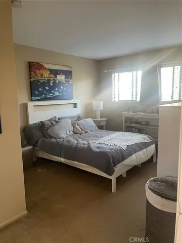 a bathroom with a toilet and a bathtub