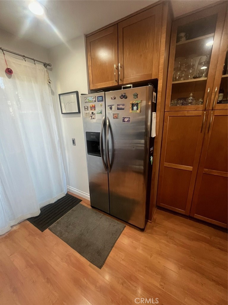 191 C. Mayor Redondo Beach, CA 90277 - Photo 8 of 20 a view of a storage & utility room with wooden floor