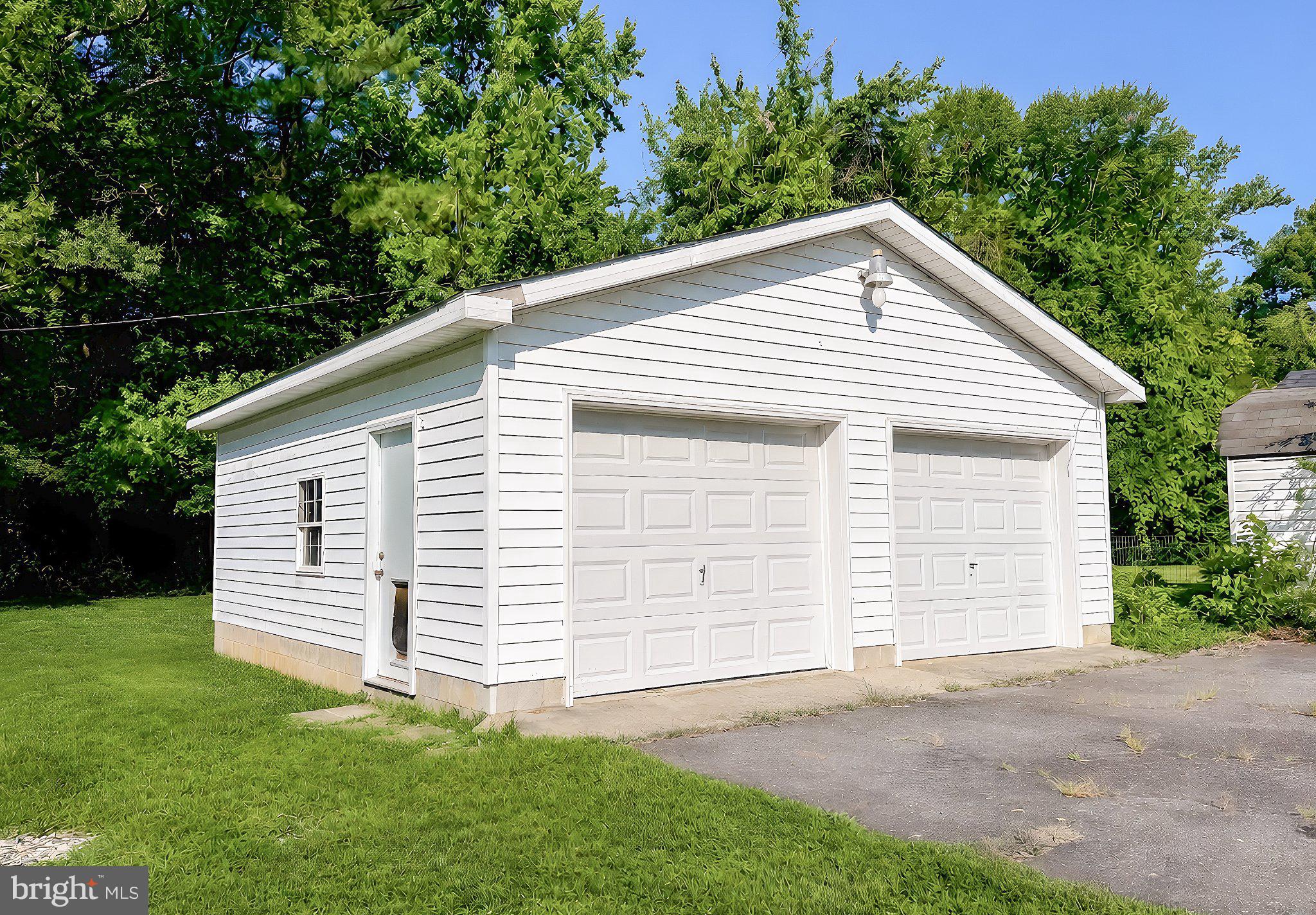 13315 Point Lookout Road Ridge, MD 20680 - Photo 49 of 51 Charming dual-garage retreat.