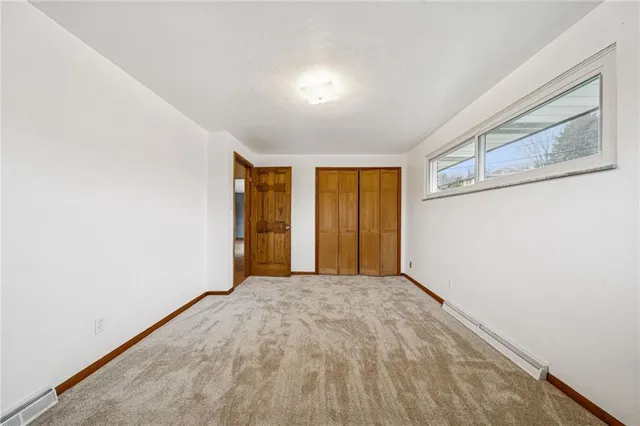 a view of an empty room with window