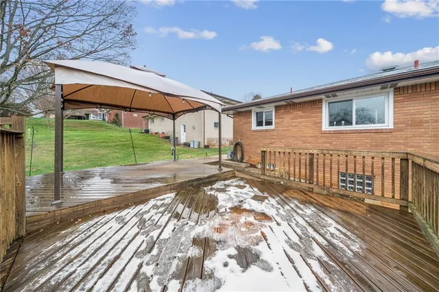 a view of a swimming pool with a lounge chair