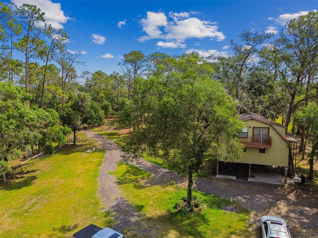 2853 Saffold Road Wimauma, FL 33598 - Photo 58 of 62 a view of a yard with swimming pool