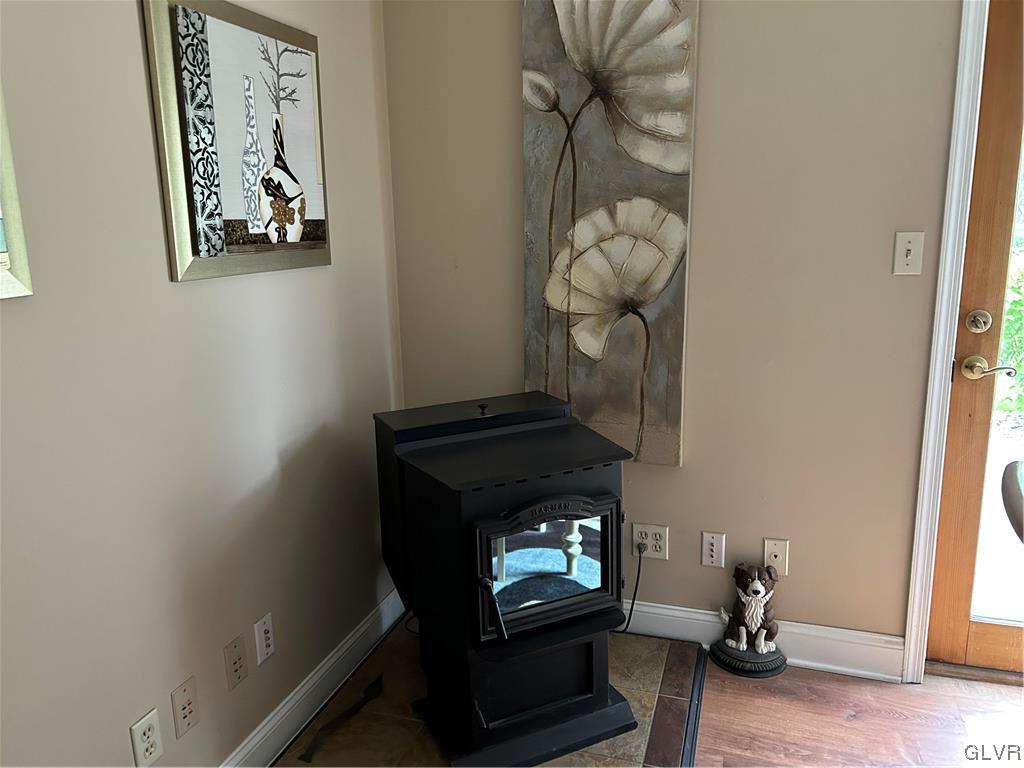 2139 Amlisa Road Nazareth, PA 18064 - Photo 16 of 35 a living room with furniture and a fireplace