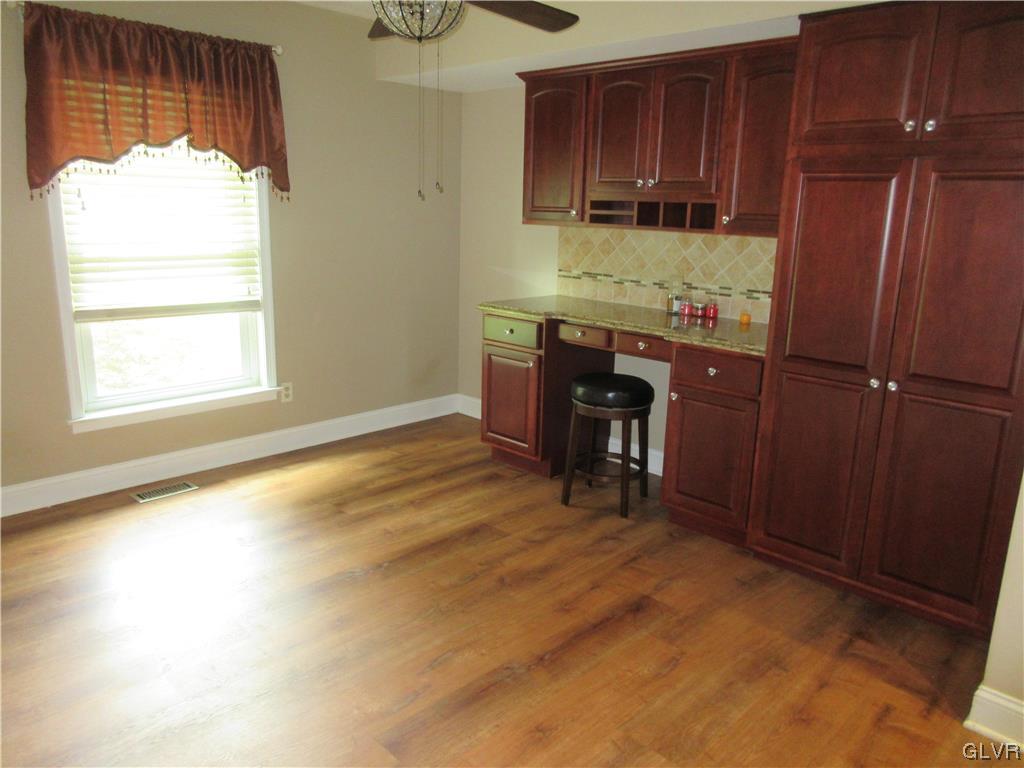 2139 Amlisa Road Nazareth, PA 18064 - Photo 19 of 35 an empty room with wooden floor and windows