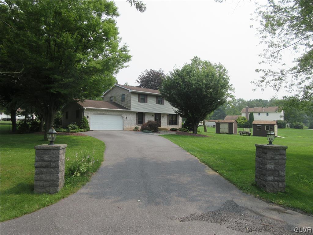 2139 Amlisa Road Nazareth, PA 18064 - Photo 2 of 35 a front view of a house with a yard