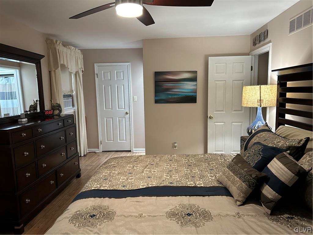 2139 Amlisa Road Nazareth, PA 18064 - Photo 22 of 35 a bedroom with a bed and wooden floor