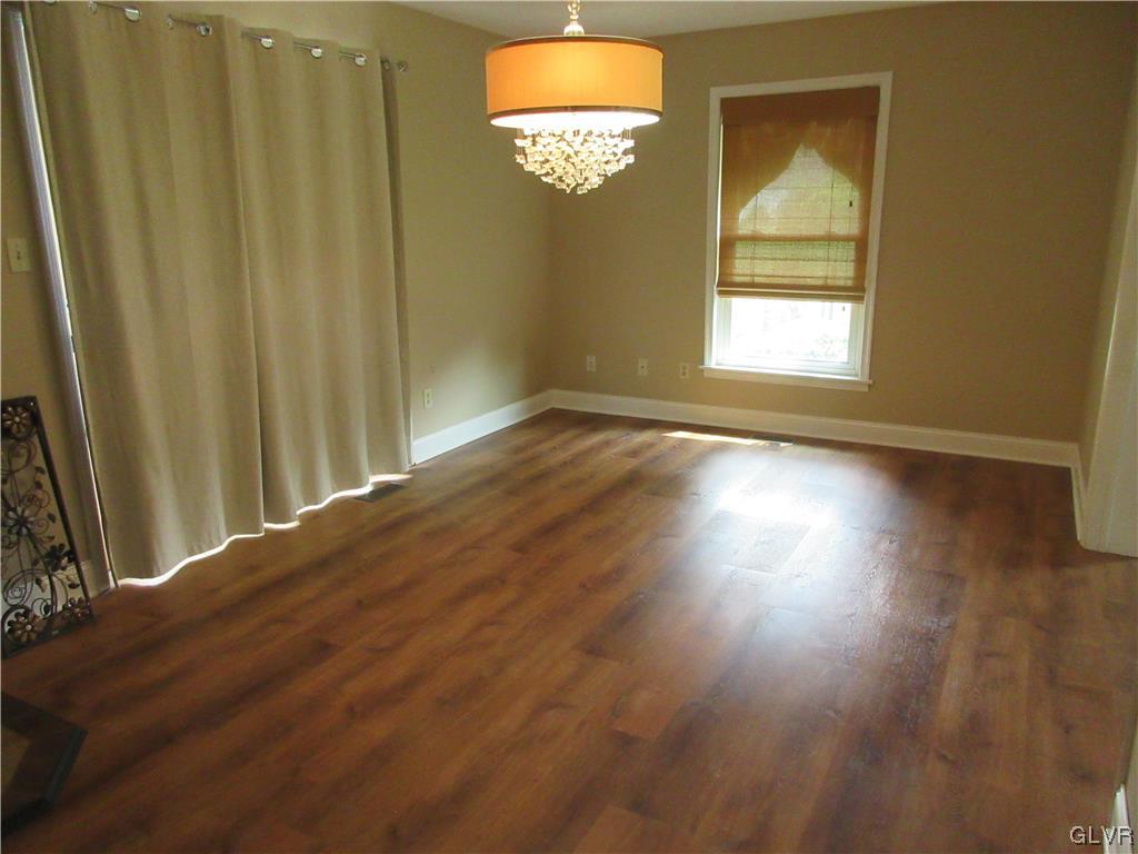2139 Amlisa Road Nazareth, PA 18064 - Photo 34 of 35 a view of a livingroom with wooden floor and a window