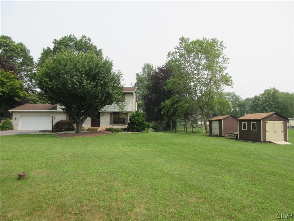 2139 Amlisa Road Nazareth, PA 18064 - Photo 4 of 35 a view of a house with backyard and trees