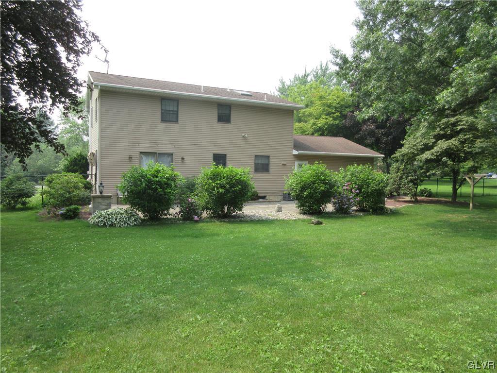 2139 Amlisa Road Nazareth, PA 18064 - Photo 9 of 35 a house that is sitting in the grass