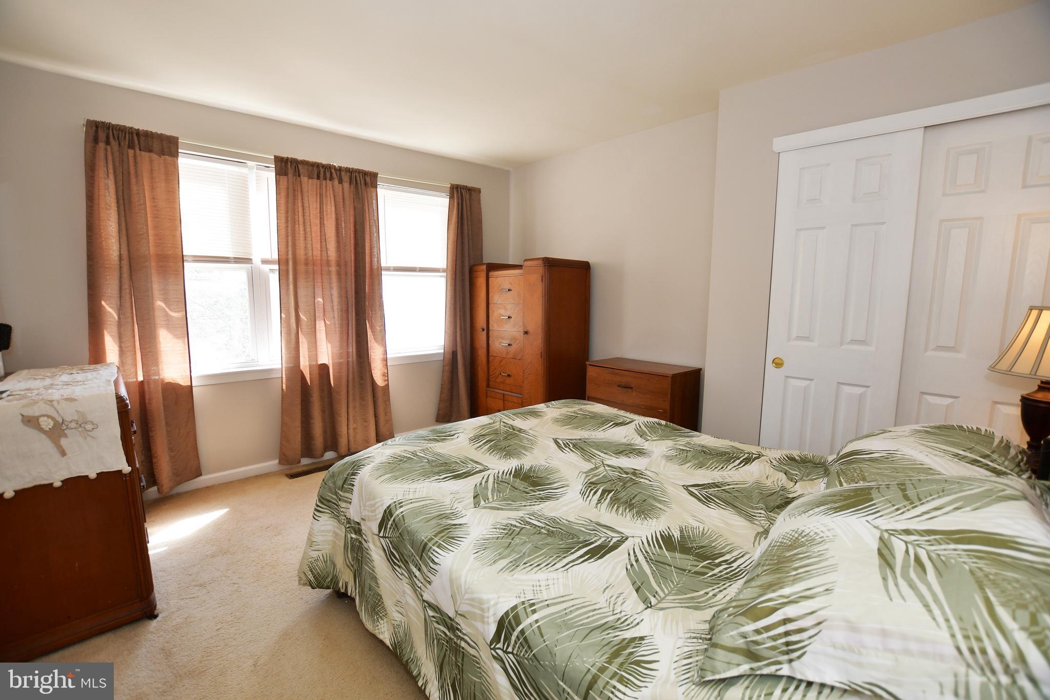 256 Powell Road Springfield, PA 19064 - Photo 21 of 34 Master bedroom with plenty of windows and sunlight