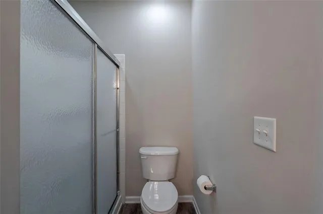 a bathroom with a toilet