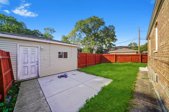 a backyard of a house with lots of green space