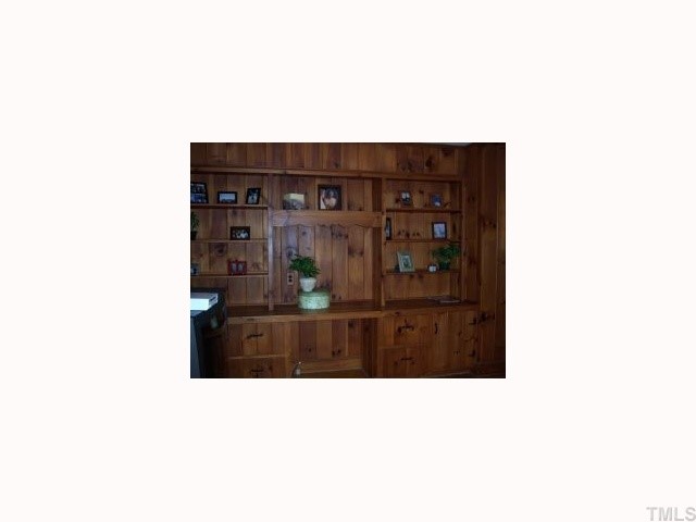 1813 Jimmie Kerr Road Graham, NC 27253 - Photo 3 of 9 Cozy den with pine built-ins