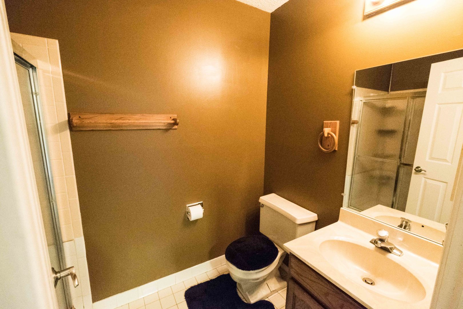 74 Foxcroft Road Naperville, IL 60565 - Photo 22 of 24 a bathroom with a sink and a mirror