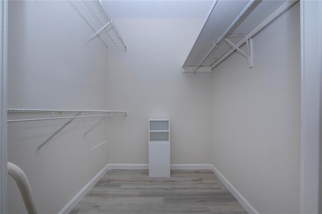 3259 South Beneva Road, Unit 102 Sarasota, FL 34232 - Photo 15 of 38 a view of an empty walk in closet