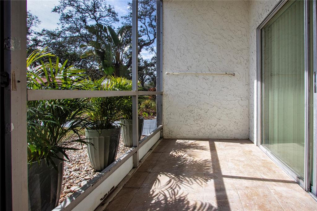 3259 South Beneva Road, Unit 102 Sarasota, FL 34232 - Photo 23 of 38 a balcony view with wooden floor