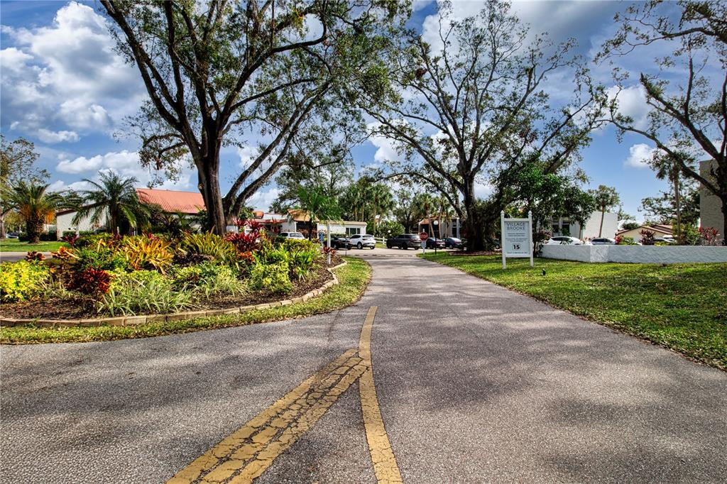3259 South Beneva Road, Unit 102 Sarasota, FL 34232 - Photo 25 of 38 a view of a park with large trees