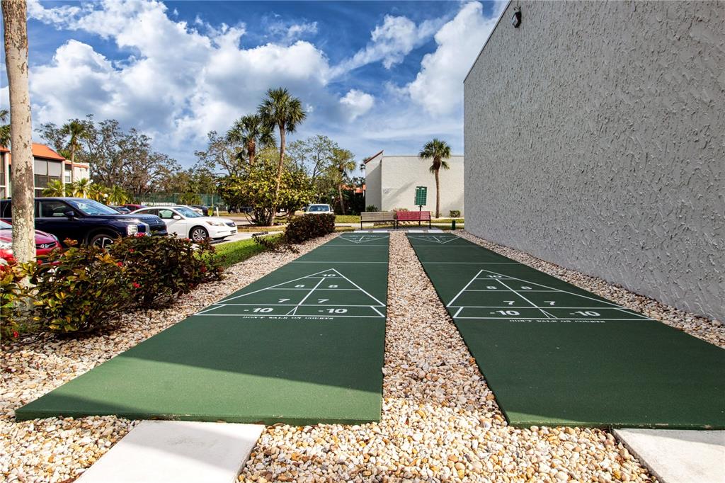 3259 South Beneva Road, Unit 102 Sarasota, FL 34232 - Photo 33 of 38 a view of a swimming pool with a yard