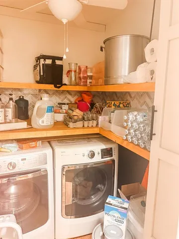 a utility room with washer and dryer