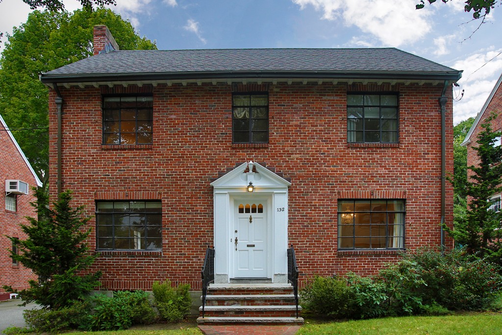 132 Bonad Road Brookline, MA 02467 - Photo 1 of 5 a front view of a house with a yard