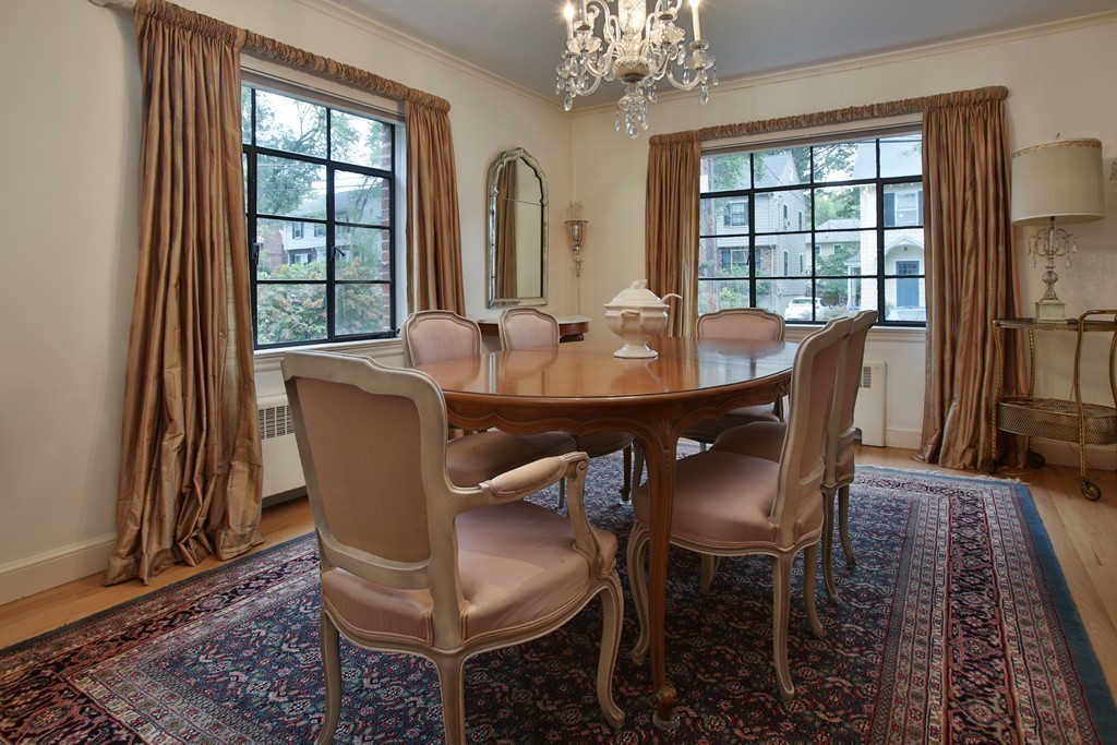 132 Bonad Road Brookline, MA 02467 - Photo 3 of 5 a view of a dining room with furniture window and wooden floor