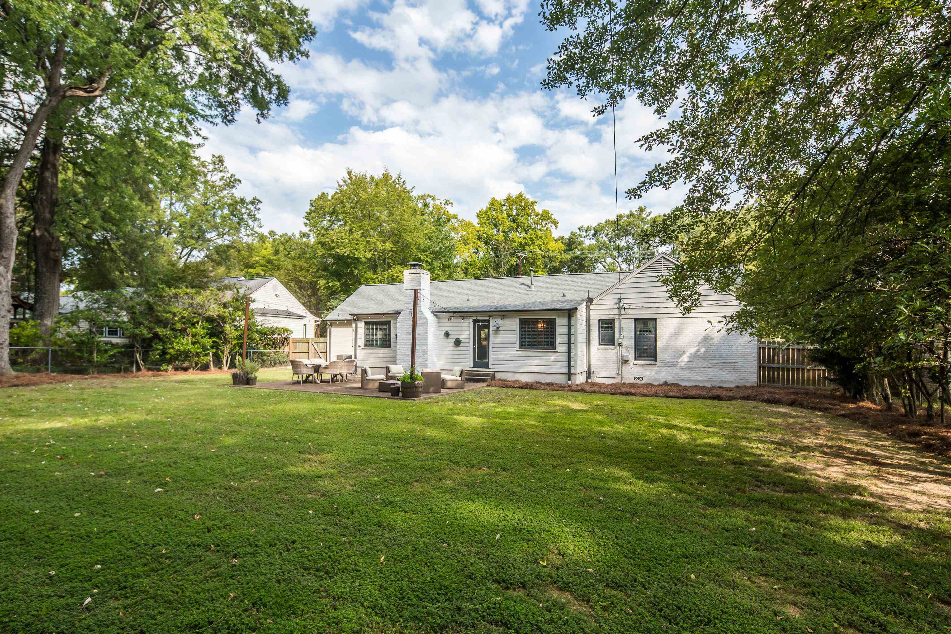5271 Mason Road Memphis, TN 38120 - Photo 24 of 25 a front view of a house with a garden