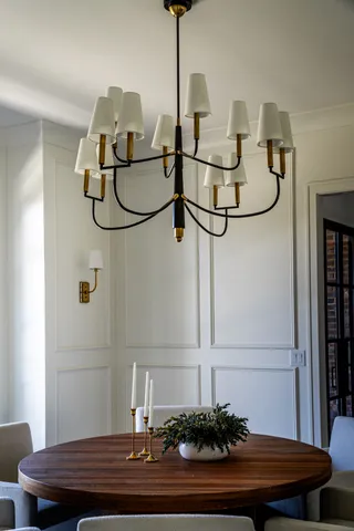 a room with a table and chairs