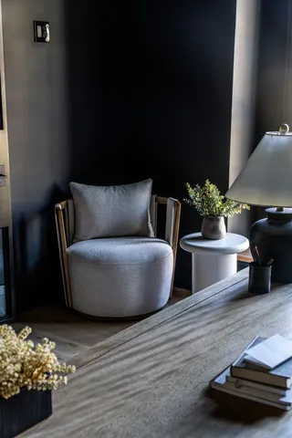 a bedroom with furniture and window