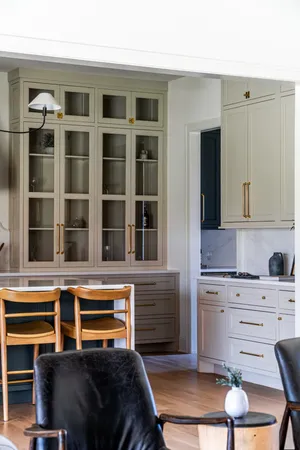 a bedroom with a bed and cabinets