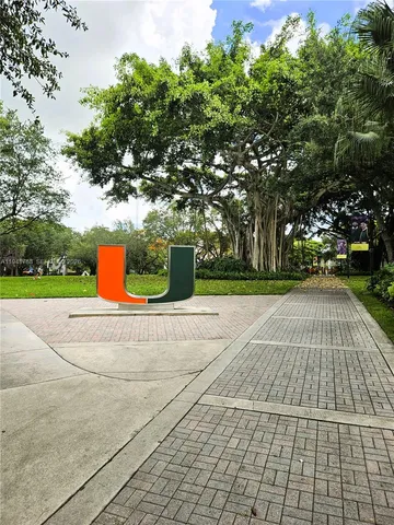 a view of street with parked cars