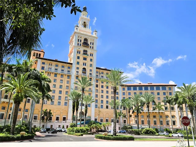a view of a lake and yard